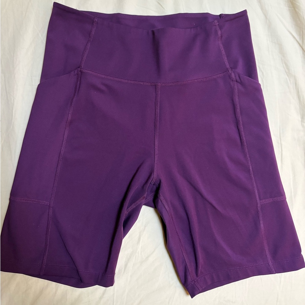 Girlfriend collective 

Plum High-Rise Pocket Bike Short